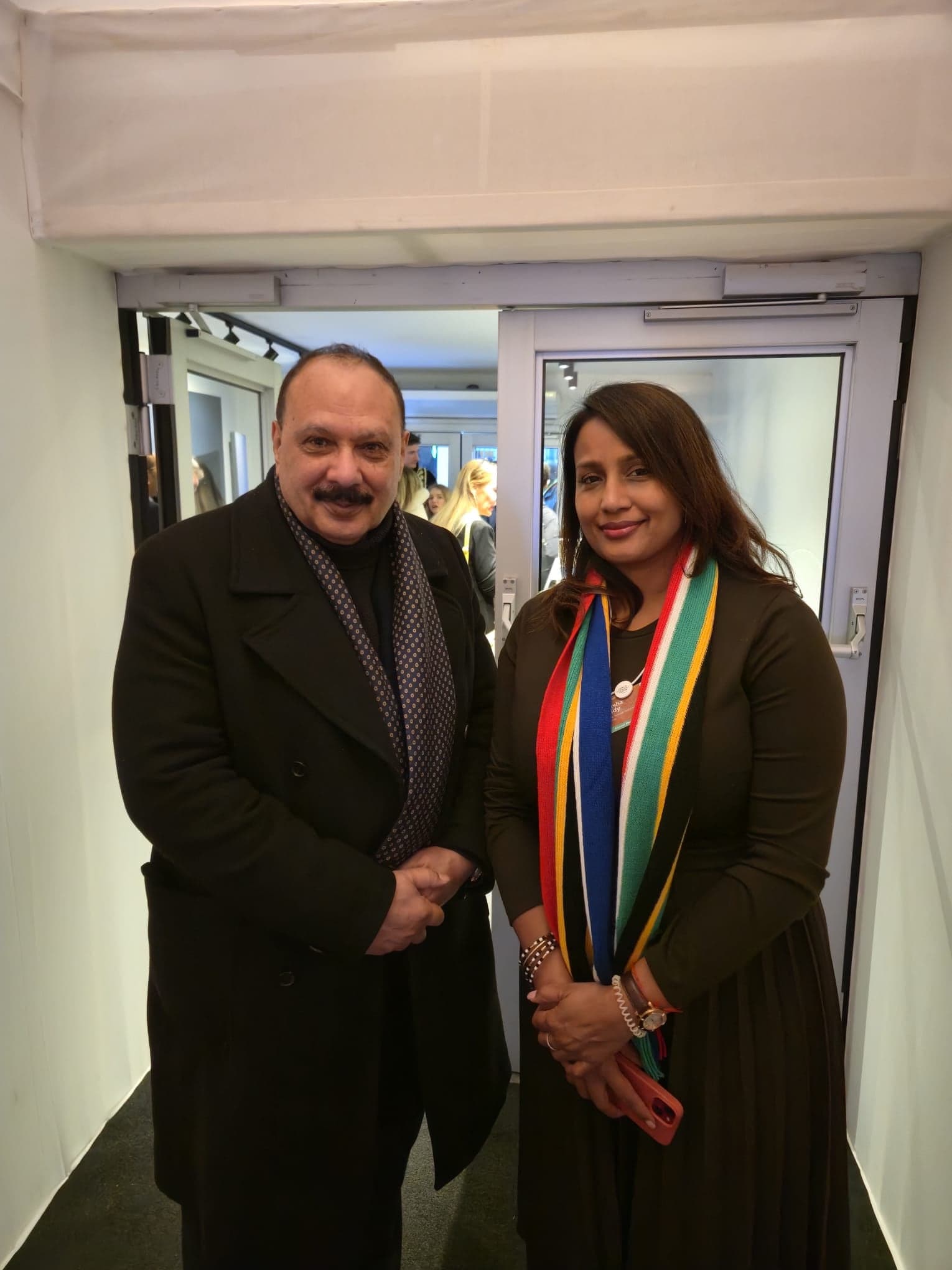Two delegates arriving at an event