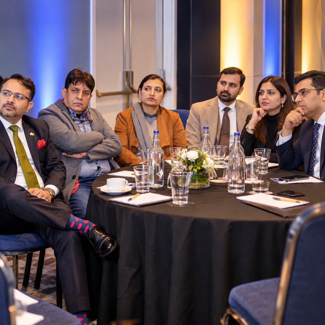Entrepreneurs and professionals in discussion at a round table