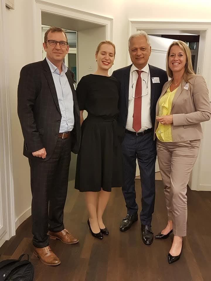 Guests together at an evening networking reception