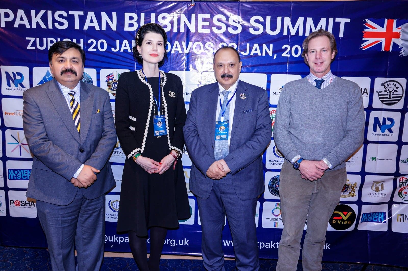 Business leaders photographed together at a business event