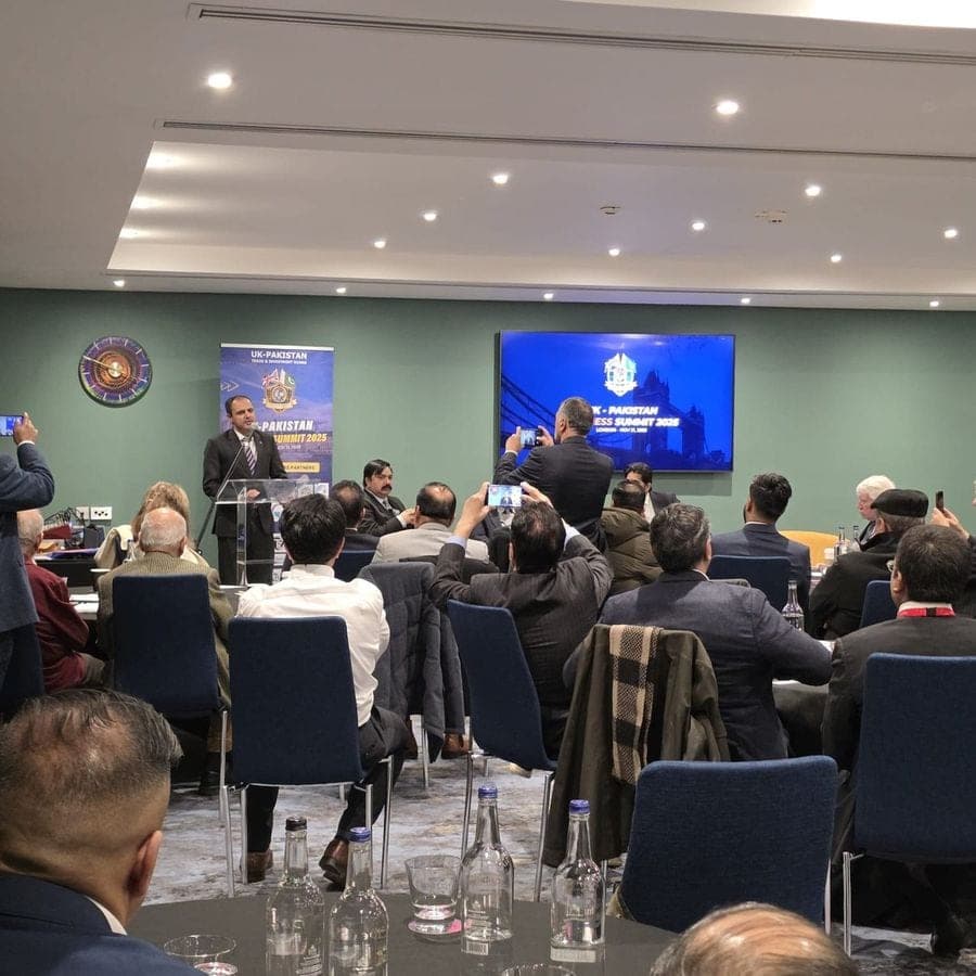 A business forum with a speaker and audience