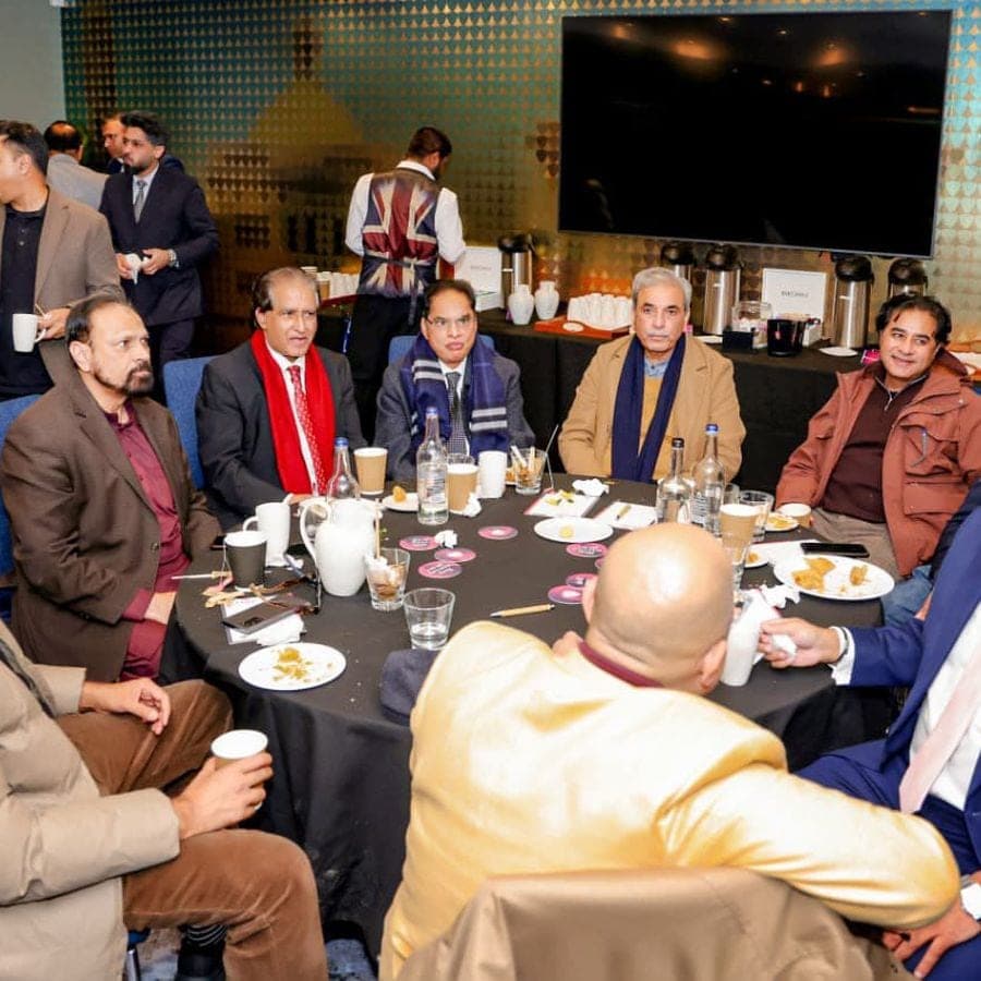 Business leaders in discussion at a roundtable