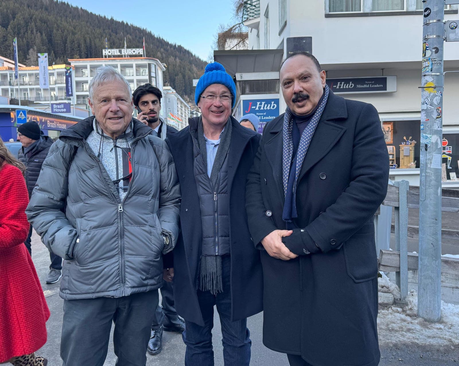 A business delegation together on a winter street abroad