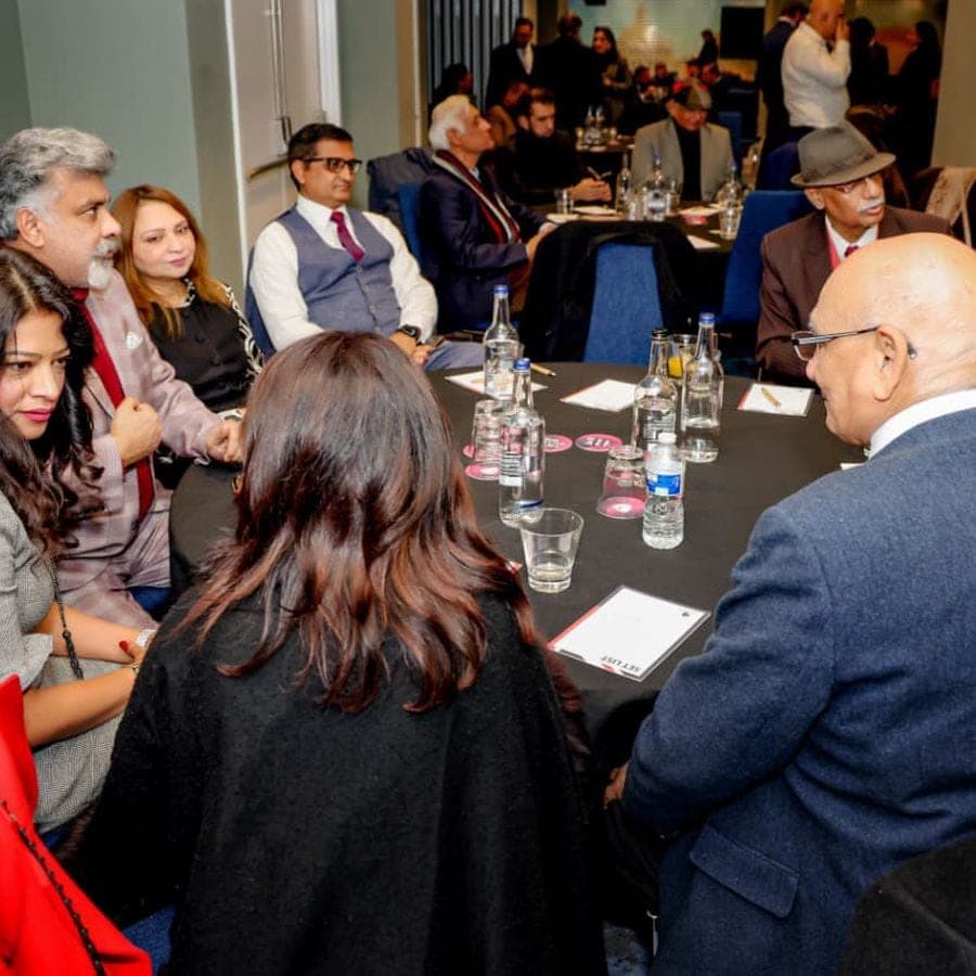 Guests networking at a table