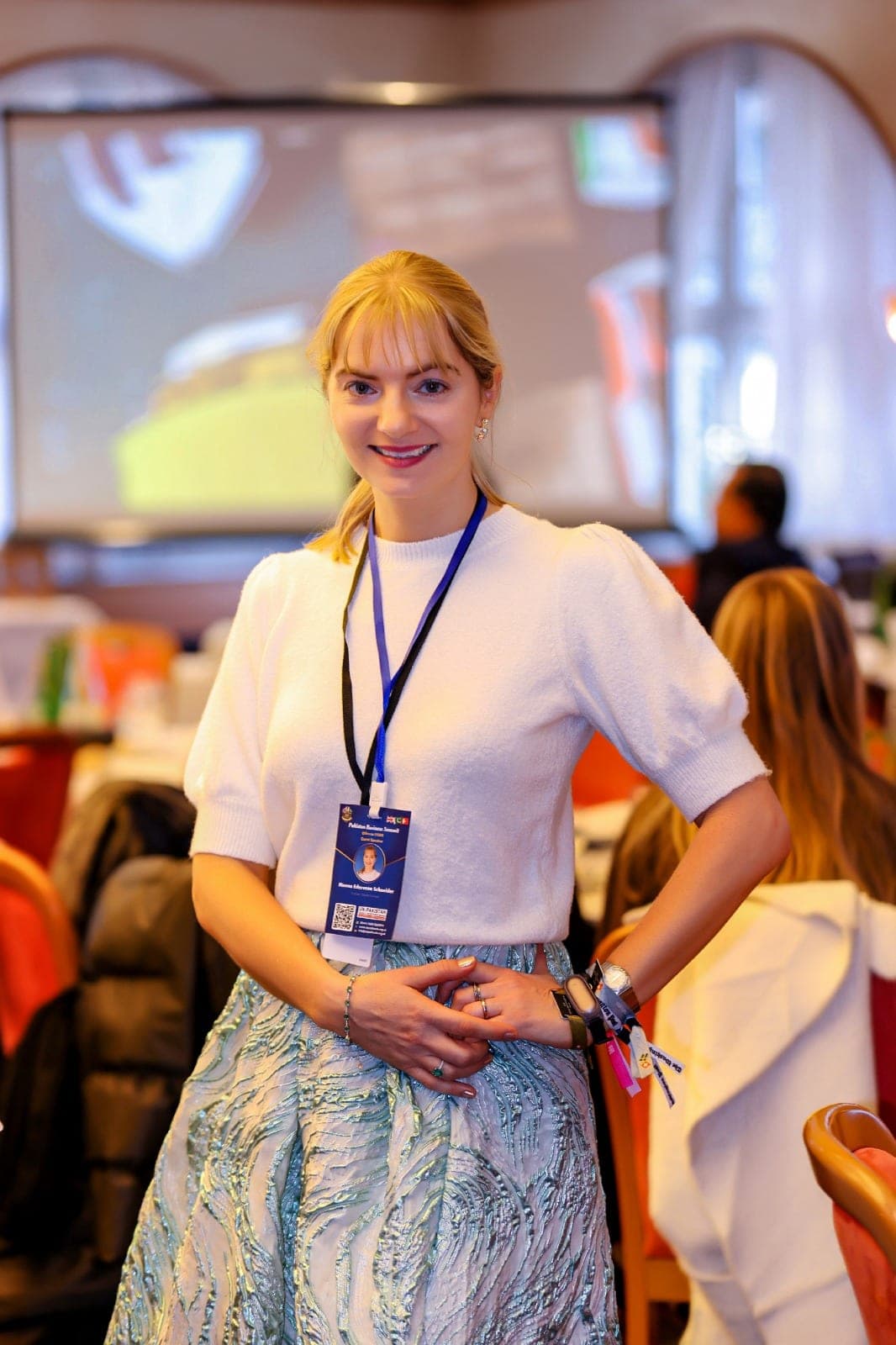 A woman delegate at a business summit